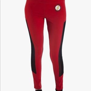 New size: m red and black leggings with mesh on sides and the flash logo on it